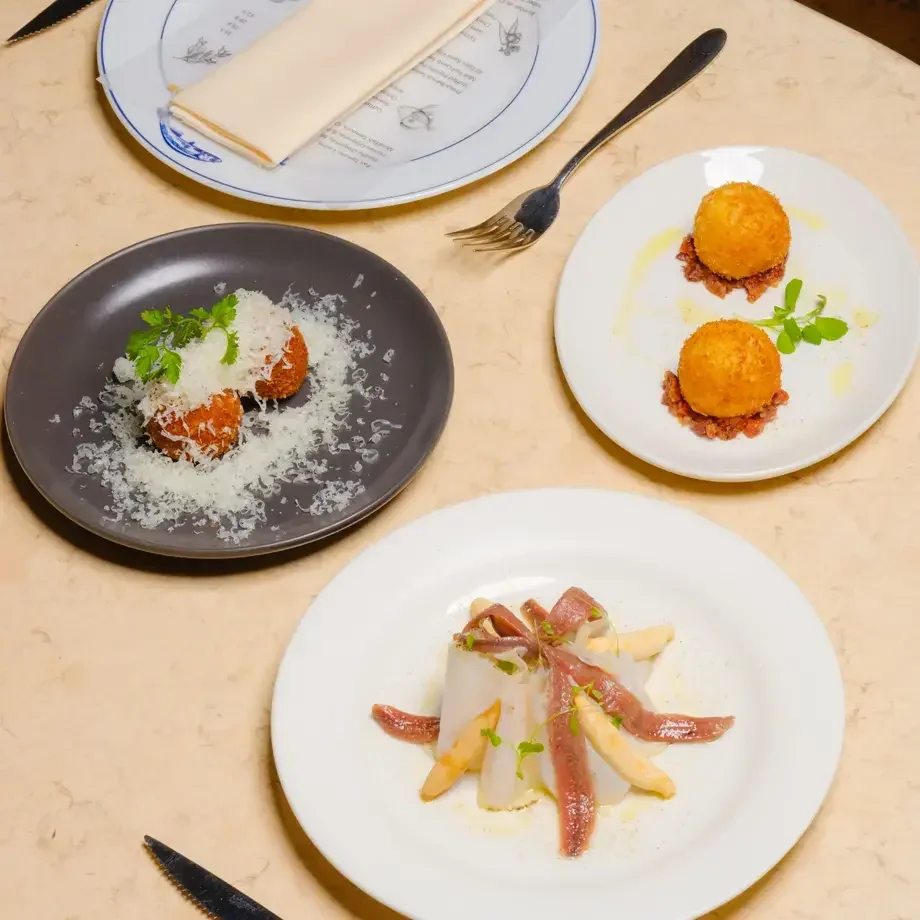 Dishes at Sabor, including croquetas.