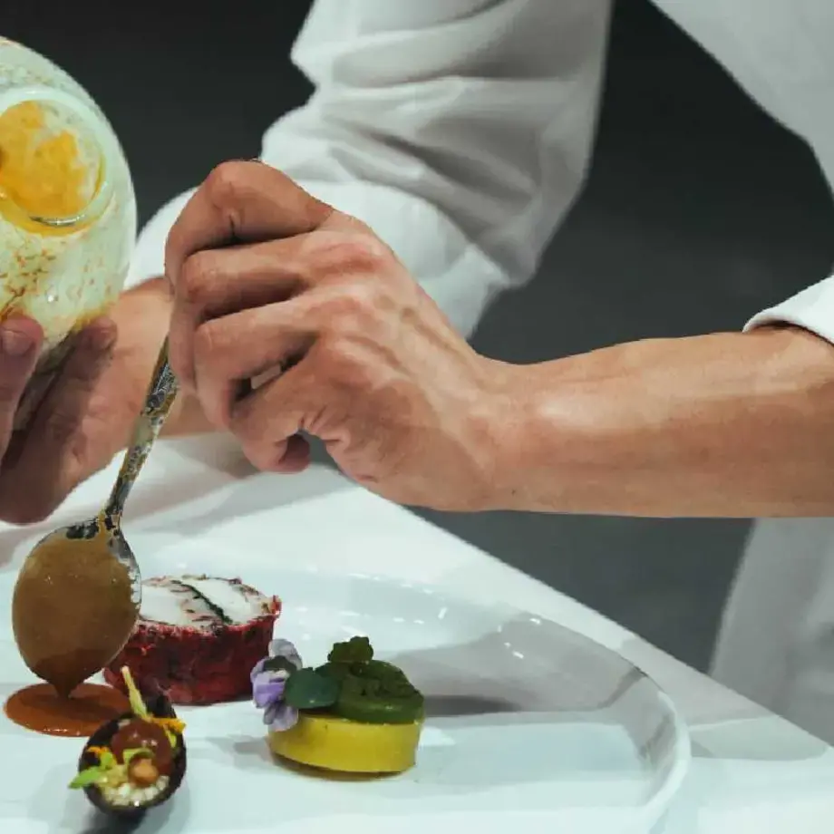 UK chef plating at Bocuse d'Or 2023.