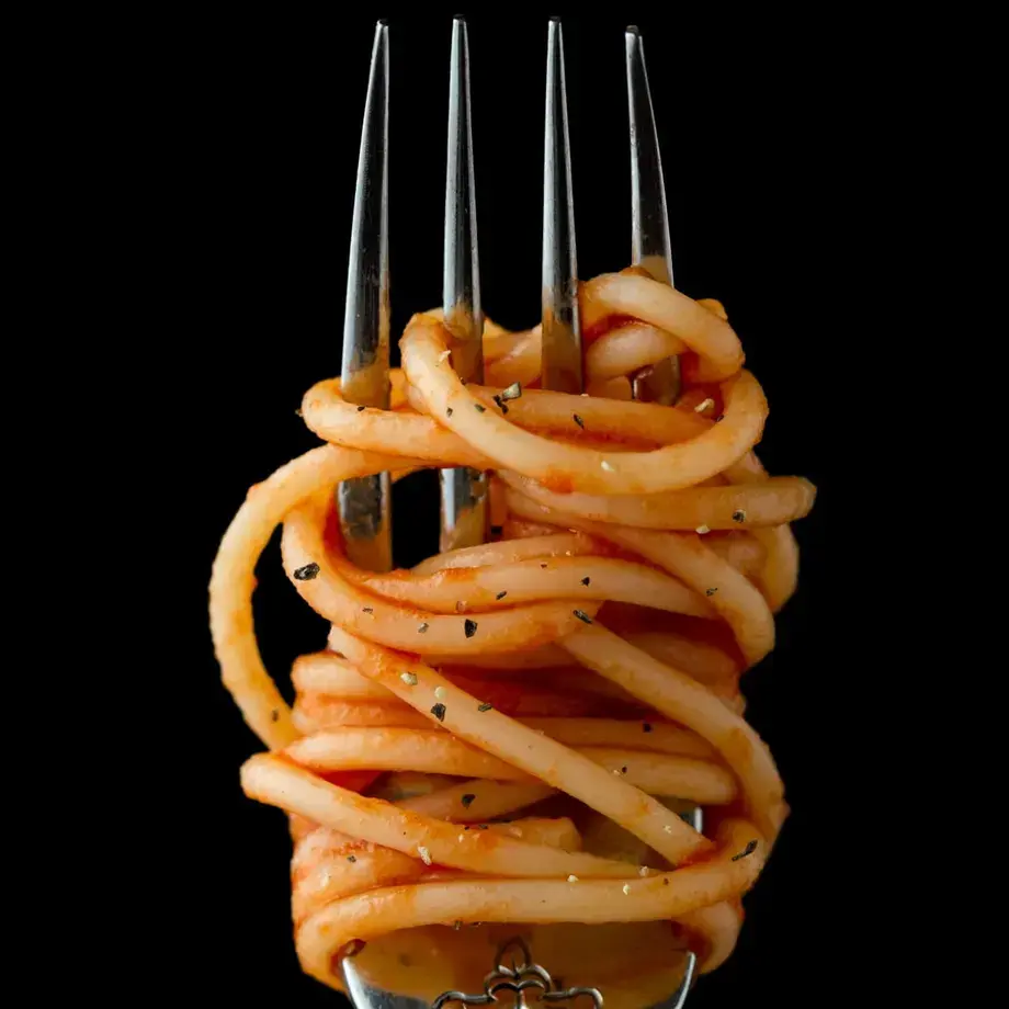Spaghetti, twirled around a fork.