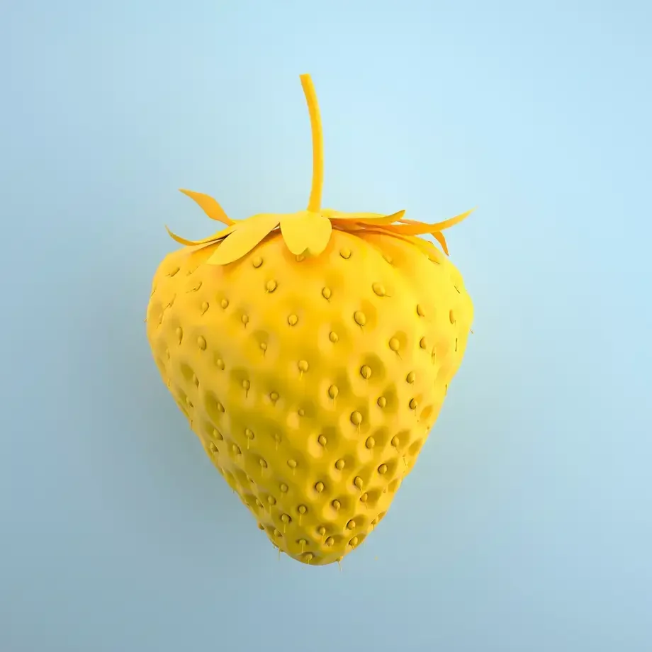 a yellow strawberry against a blue background