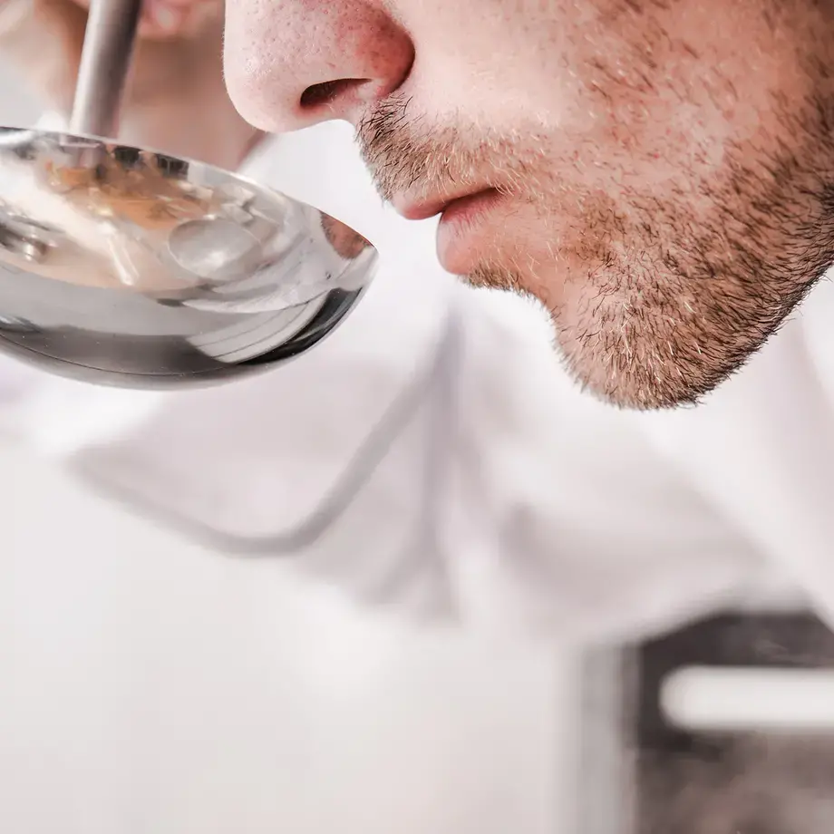 Chef tasting food