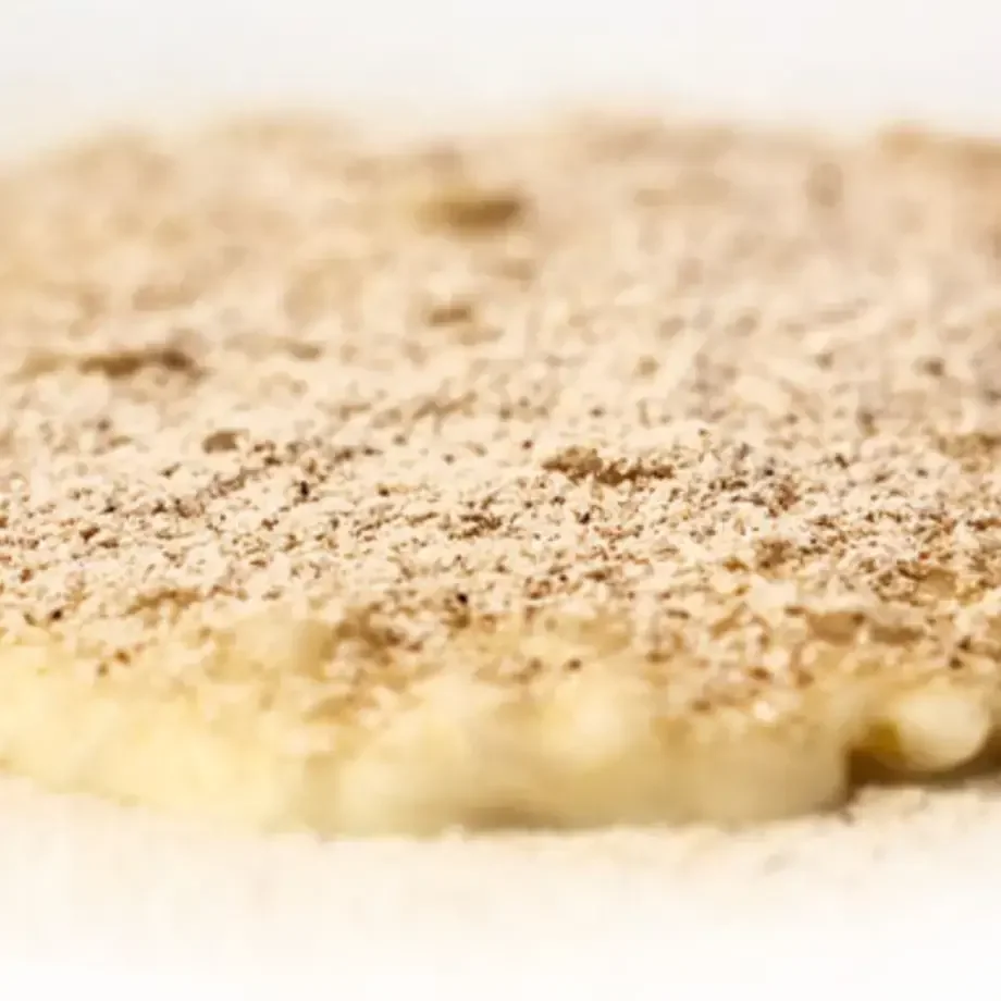 Carnaroli Rice with Birch Broth, Double Crème and Smoked Chestnut Powder