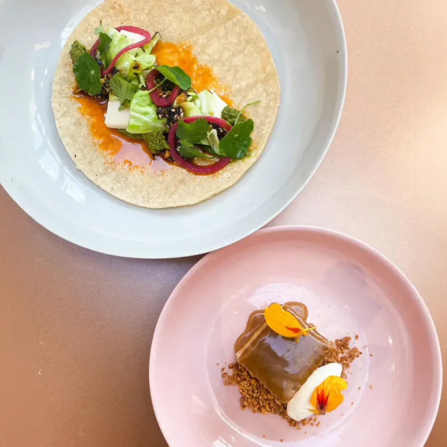 Corn tortilla with spiced and roasted cauliflower stems by OzHarvest Sydney.