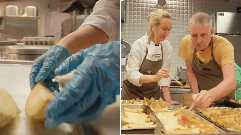 Chefs preparing vegetables wrapped in foil for baking