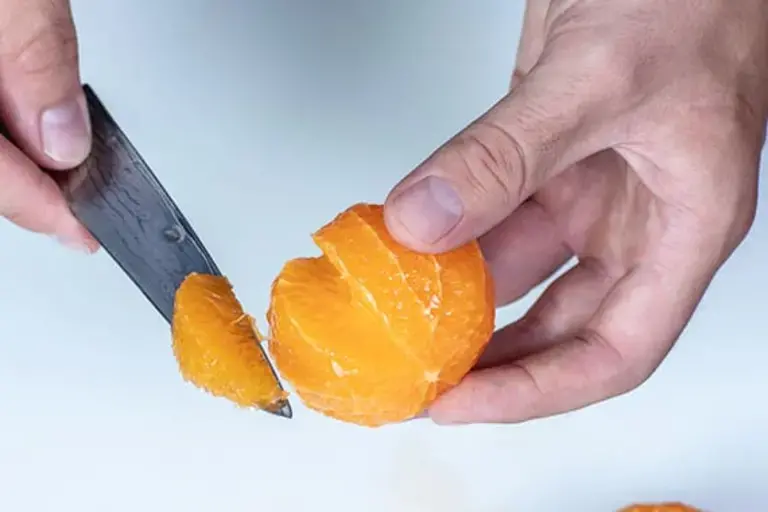 Cutting clementines Courtesy of Chef Łukasz Moneta