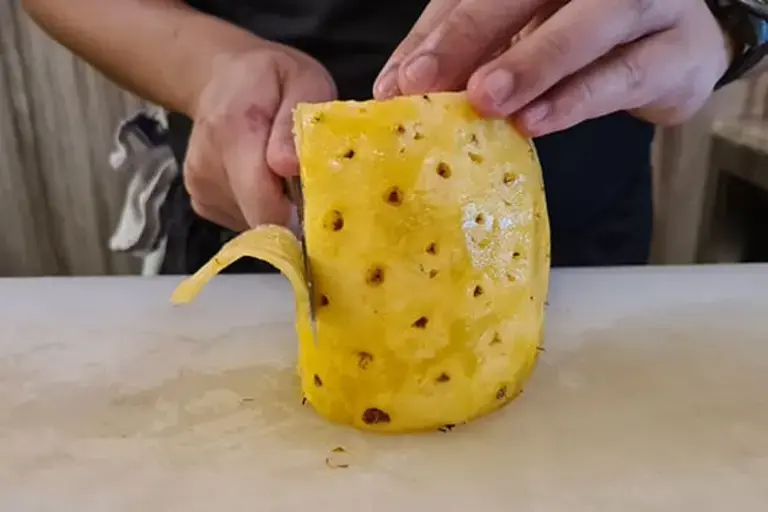 Slice pineapple