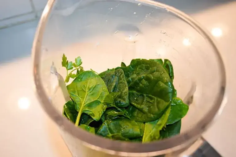 Cooking the spinach by Callan Austin