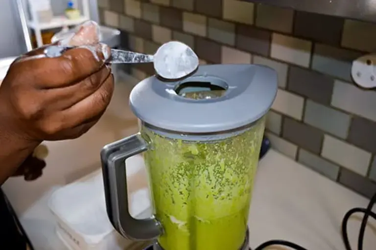 Spinach in a blender by Callan Austin