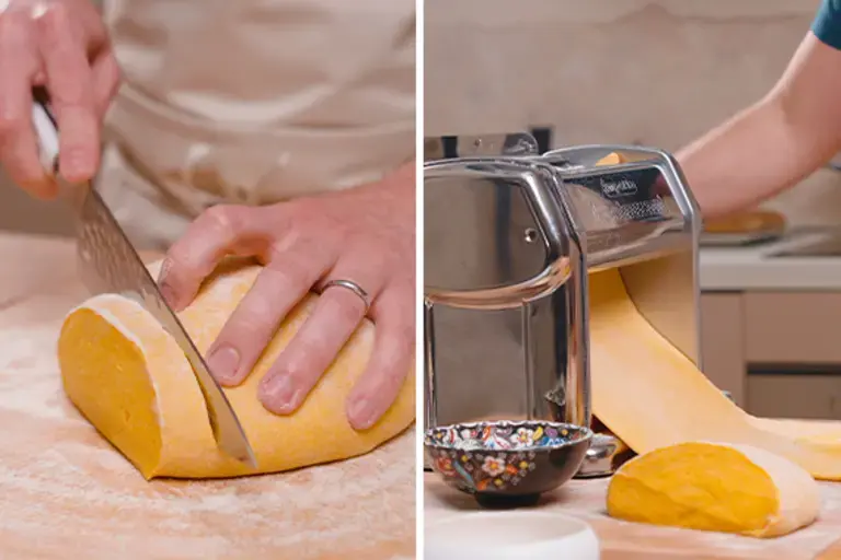 Passing pasta through a pasta machine.