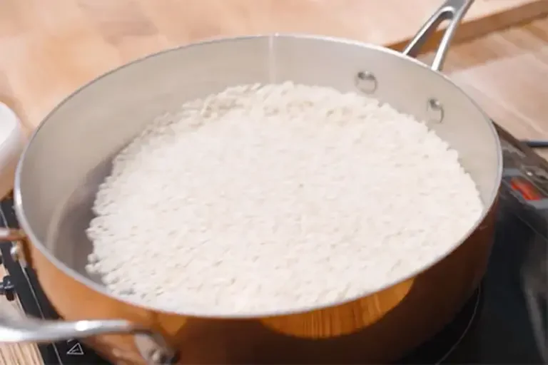 Toasting the rice.