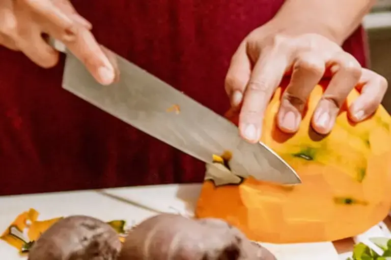 Cutting the pumpkin Courtesy of Chef Kezia Kristel