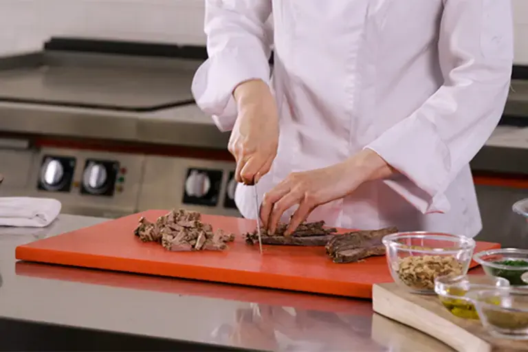 Beef leftovers being chopped