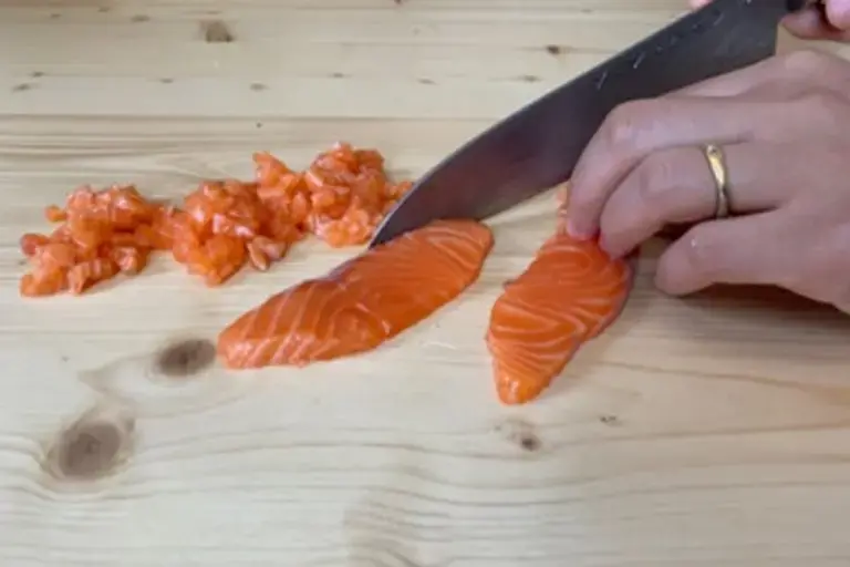 cutting the trout Courtesy of Chef Mengxin Zhou