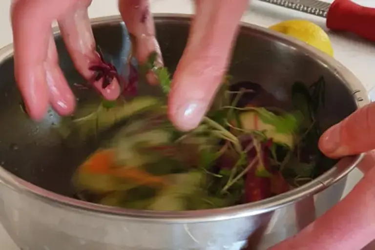 Mixing the salad Courtesy of Chef Marcus Gericke