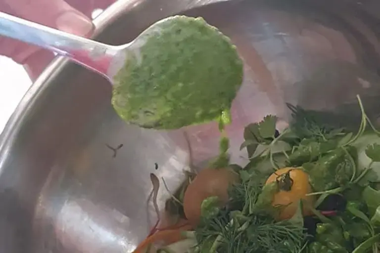 dressing the salad Courtesy of Chef Marcus Gericke