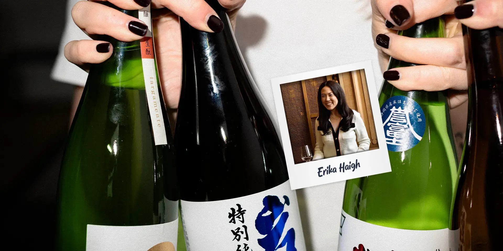 A woman holding bottles of sake and Erika Haigh