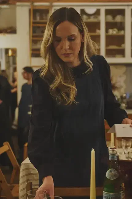 Creator Anna Laverty setting a table.