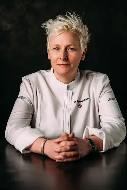 Chef Lisa Goodwin-Allen in chef whites.