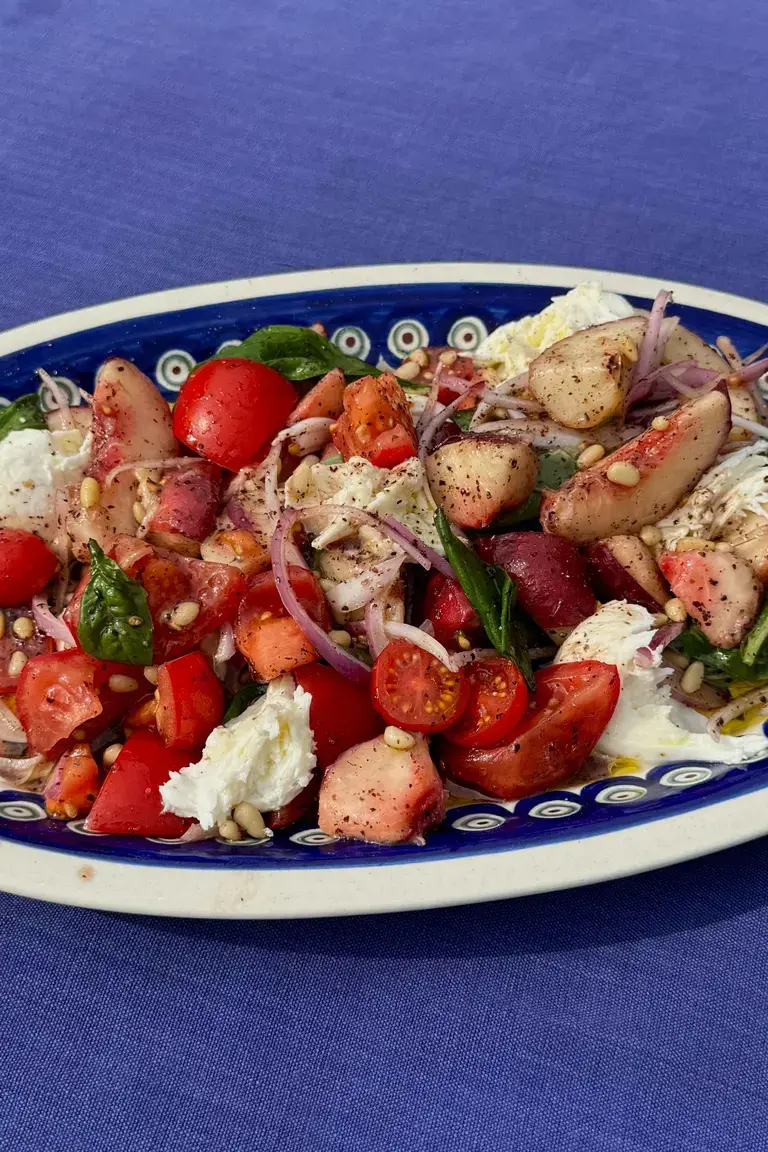 Tomato summer salad by Jordon Ezra King.