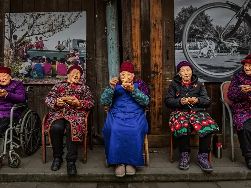 The Elderly Having Delicious Food by Xiaoling Li.