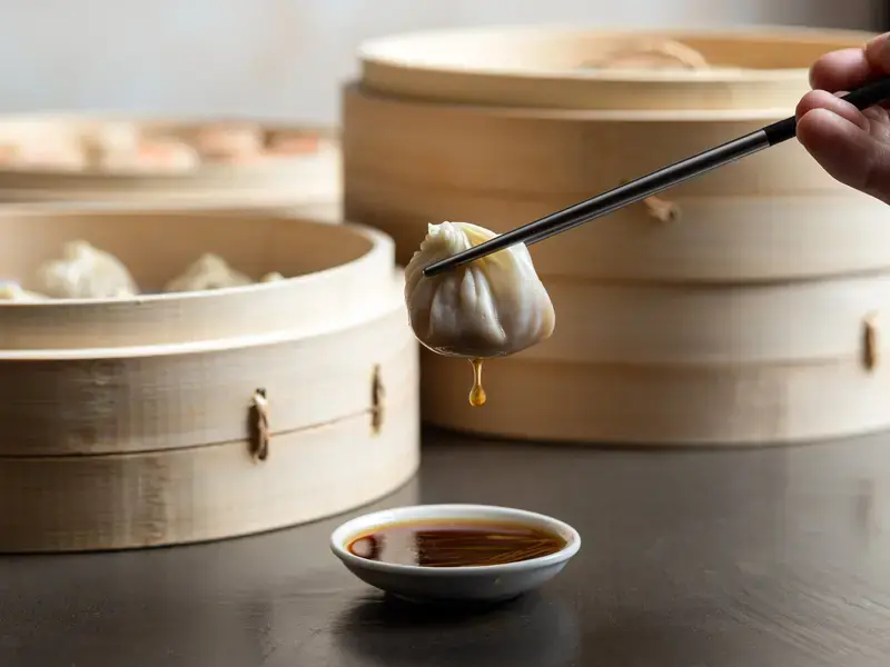 Dumpling and dipping sauce at Din Tai Fung in London.