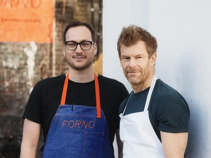 Chefs Baldo Pellegrini and Tom Aikens outside Forno.