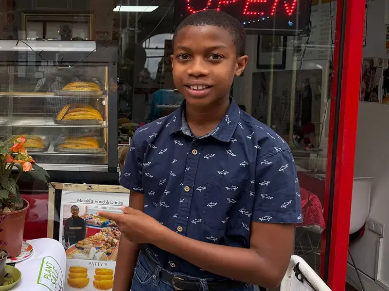 Malaki Conteh outside Malaki's Food &amp; Drinks.
