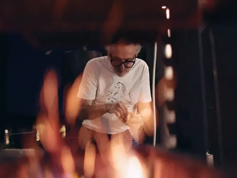 Chef Massimo Bottura in a white t-shirt.