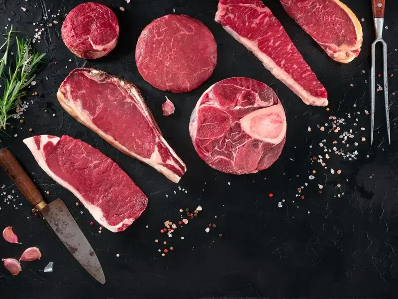 A selection of raw beef cuts.