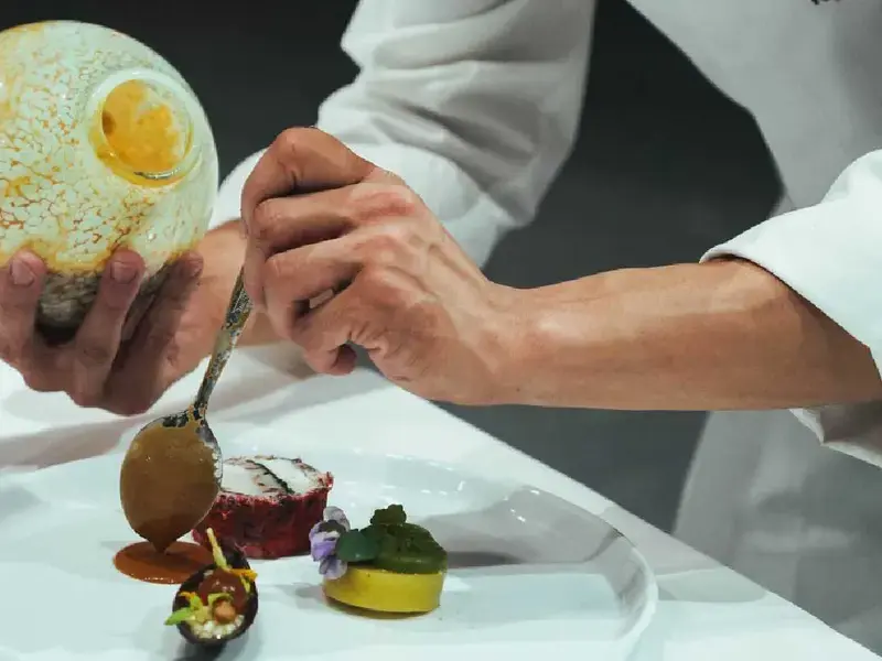 UK chef plating at Bocuse d'Or 2023.