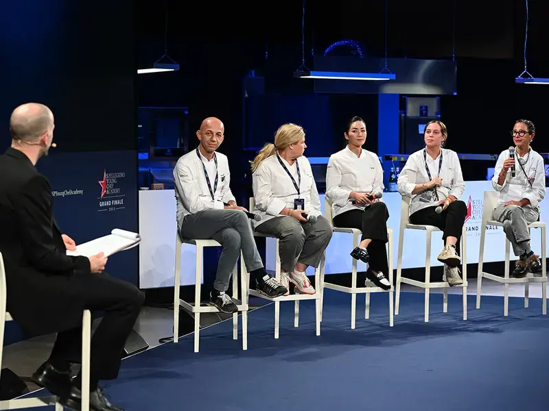 Tom Jenkins moderating the Forum at S.Pellegrino Young Chef Academy Grand Finale.