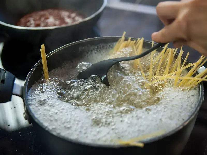 Pasta cooking in a boiling pot