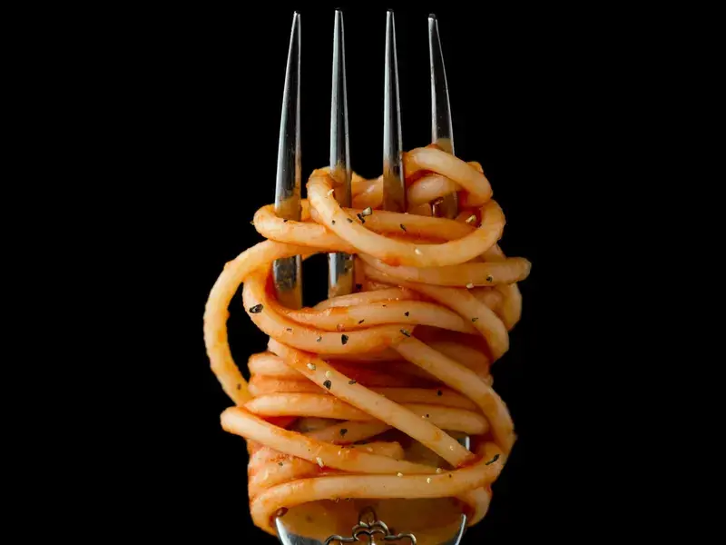 Spaghetti, twirled around a fork.