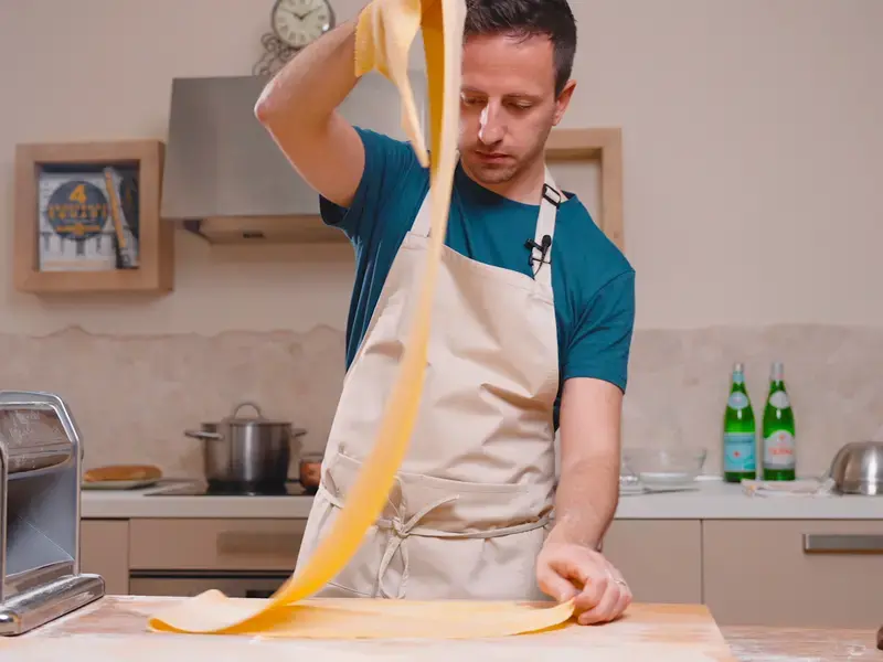 Chef Danilo Cortellini making fresh pasta.