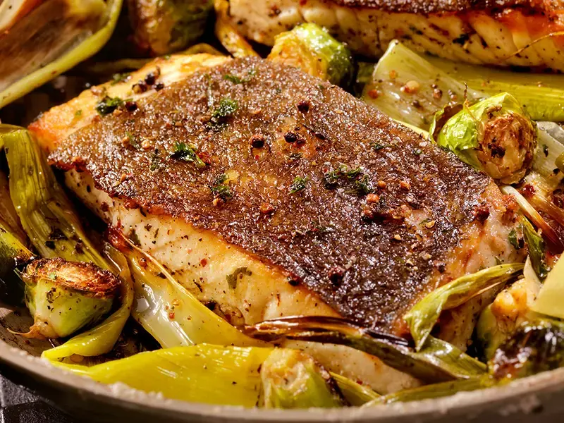 Cooked fish with a crispy skin.