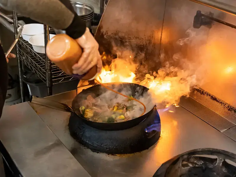 Wok on a fire