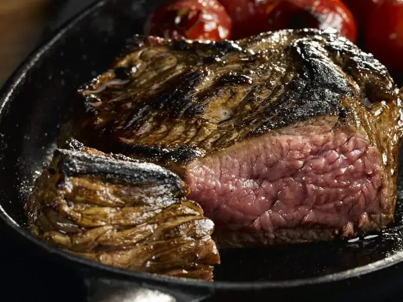 A piece of bavette in a pan.