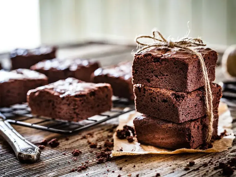 Homemade brownies ready to be stored.
