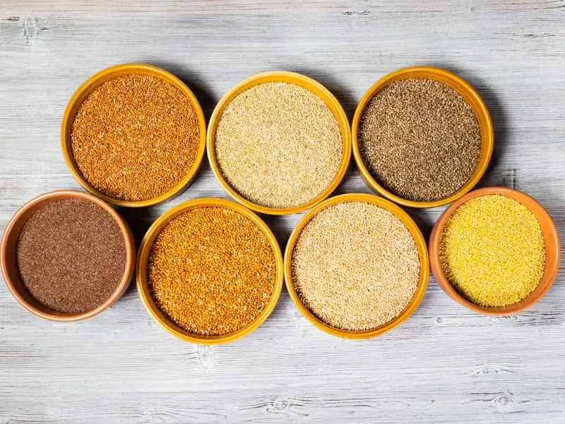 Different types of millet in bowls.