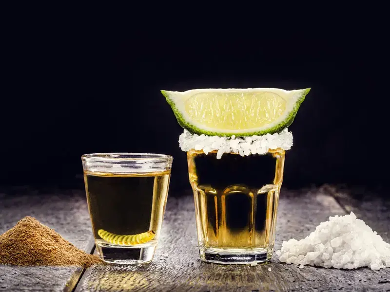 Shots of mezcal and tequila.
