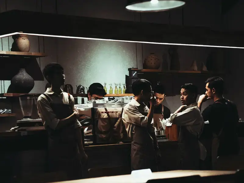 Restaurant staff at the pass.