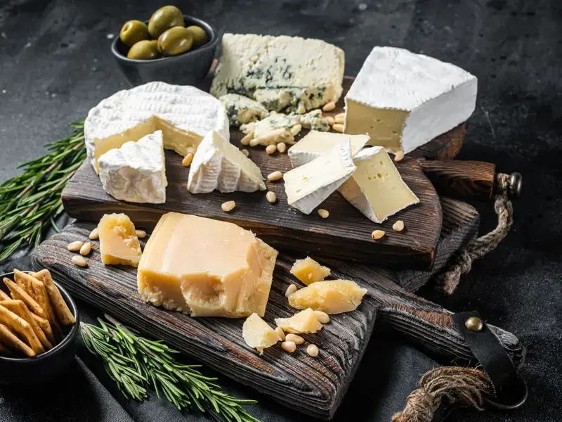 A cheeseboard with a selection of global cheeses.