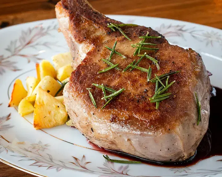 Pork chops with roasted apples.