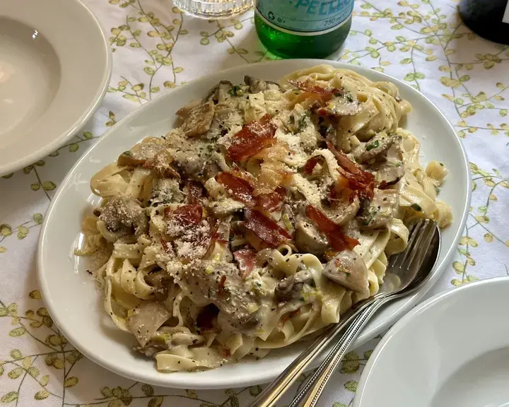 Mushroom, prosciutto and parmesan tagliatelle by Jordon Ezra King.