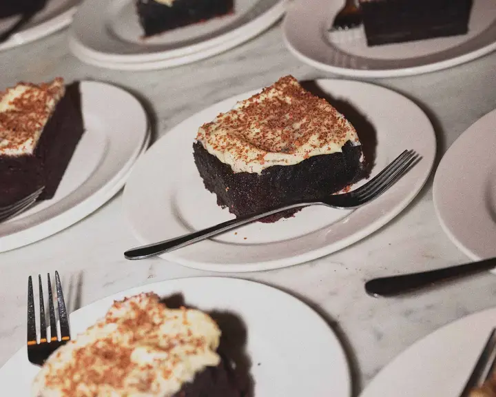 Slices of Alana Laverty's chocolate stout cake on plates.