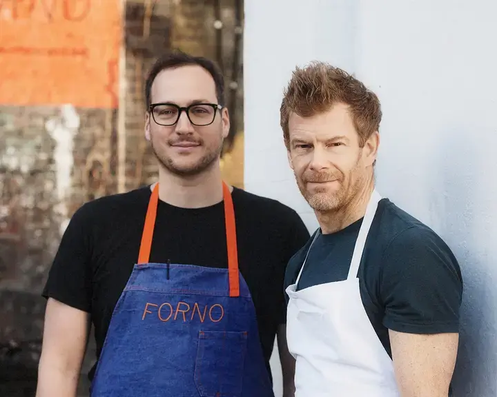 Chefs Baldo Pellegrini and Tom Aikens outside Forno.