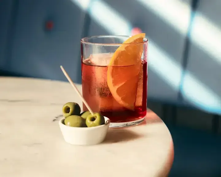 Negroni and olives ay Hey Palu in Edinburgh.