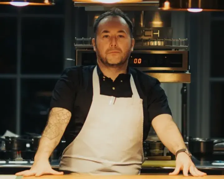 Chef Stuart Ralston standing at the pass at Lyla.