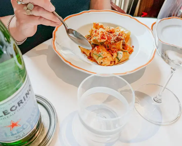 Enjoying paccheri with sea bass at Langosteria.