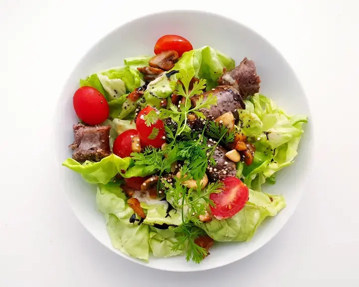A bowl of salad.